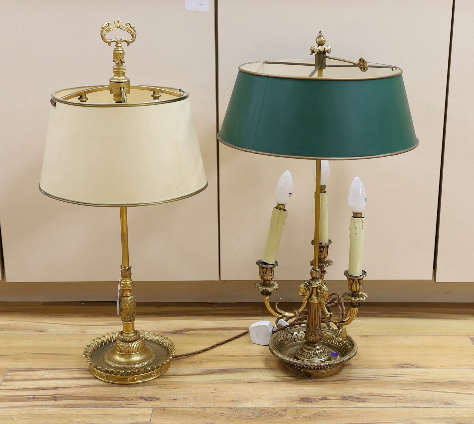 Two large French bouillotte style ornate gilt metal table lamps, tallest 70cm